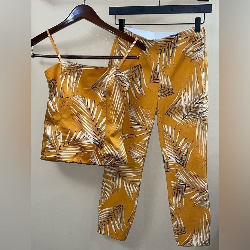 The Skinny Crop White House Black Market Pants and Palm-Print Bustier Set.